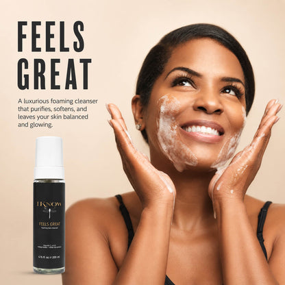 Woman applying foaming cleanser with &